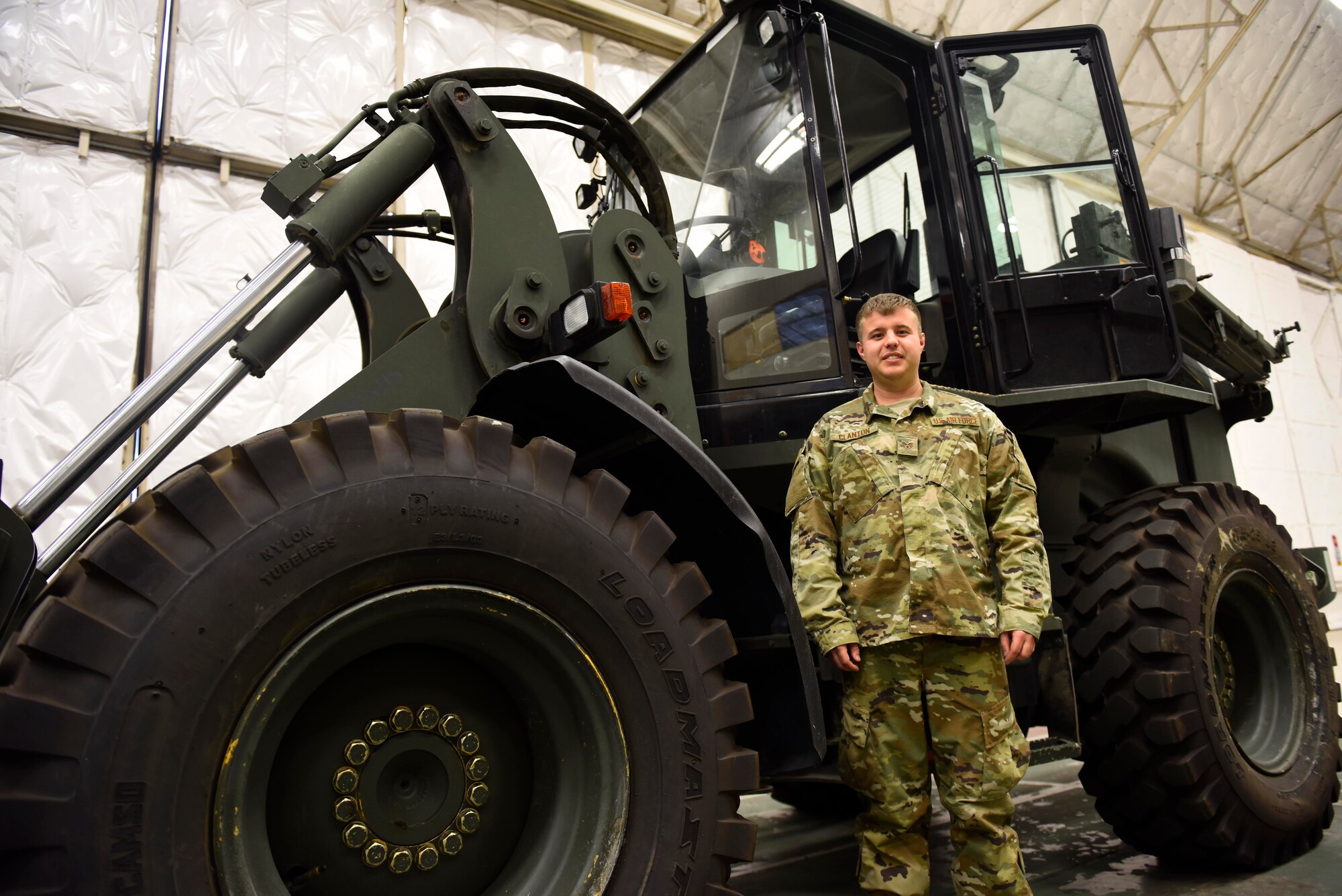 Staff Sgt. Daniel Clanton, 92nd Logistics  Readiness Squadron Air Transportation Organization supervisor, poses for a photo at Fairchild Air Force Base, Washington, Oct. 9, 2018. Clanton identified a critical error within the Integrated Computerized Deployment System cargo measuring algorithm, increasing efficiency in the movement of mission essential equipment. (U.S. Air Force photo/Airman 1st Class Lawrence Sena)