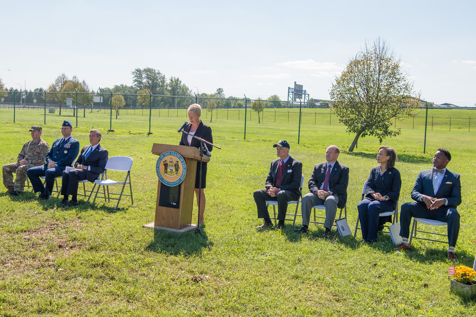 Jennifer Cohan, Secretary of the Delaware Department of Transportation, gives opening remarks during the Senior Airman Elizabeth Loncki bridge dedication ceremony Oct. 12, 2018, at Dover Air Force Base, Del.