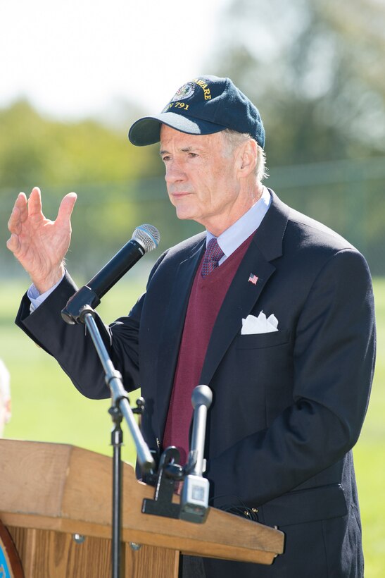 U.S. Senator Tom Carper offers remarks at the Senior Airman Elizabeth Loncki bridge dedication ceremony Oct. 12, 2018, at Dover Air Force Base, Del. Also in attendance, U.S. Senator Chris Coons, Delaware Congresswoman Blunt Rochester and Delaware Governor John Carney. (U.S. Air Force Photo by Mauricio Campino)