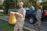 U.S. Airmen with the 116th Air Control Wing (ACW), Georgia Air National Guard, load supplies while preparing to leave Robins Air Force Base, Georgia for Seminole County, Georgia to assist with Hurricane Michael relief operations, Oct. 12, 2018. The Airmen are joining other Air National Guard members from the 116th ACW working in Seminole County and will be helping distribute food and water to people affected by the hurricane.