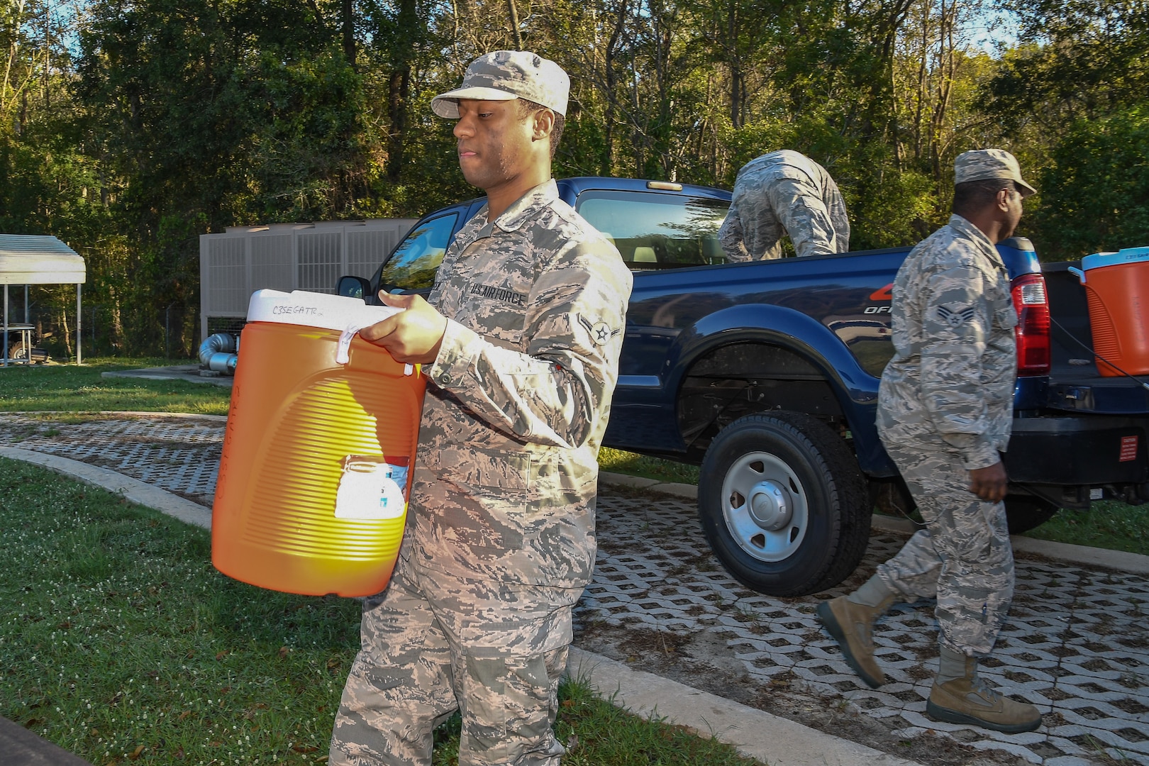 U.S. Airmen with the 116th Air Control Wing (ACW), Georgia Air National Guard, load supplies while preparing to leave Robins Air Force Base, Georgia for Seminole County, Georgia to assist with Hurricane Michael relief operations, Oct. 12, 2018.
