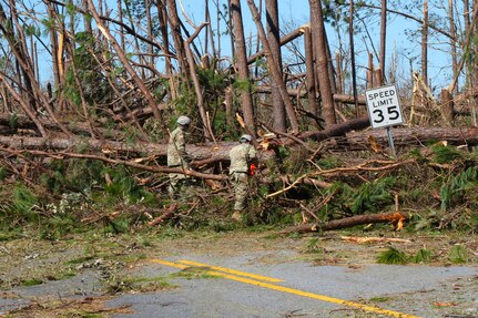 Florida National Guard members of the 753rd Brigade Engineer Battalion from Tallahassee, Florida, work on clearing the roads following the destruction of Hurricane Michael, Oct. 13, 2018, in Panama City, Florida.