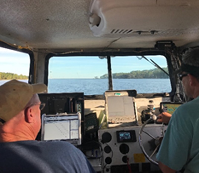 Irvington Site Office survey crew members survey the Gulf Intracoastal Waterway in the aftermath of Hurricane Michael.