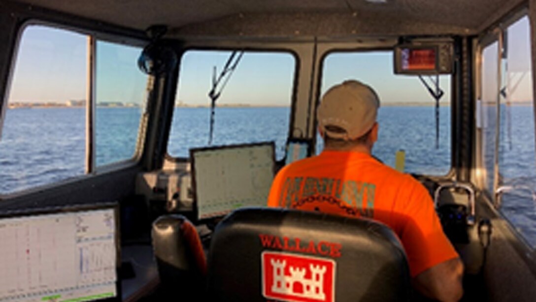 Irvington Site Office survey crew member surveys the Gulf Intracoastal Waterway in the aftermath of Hurricane Michael.