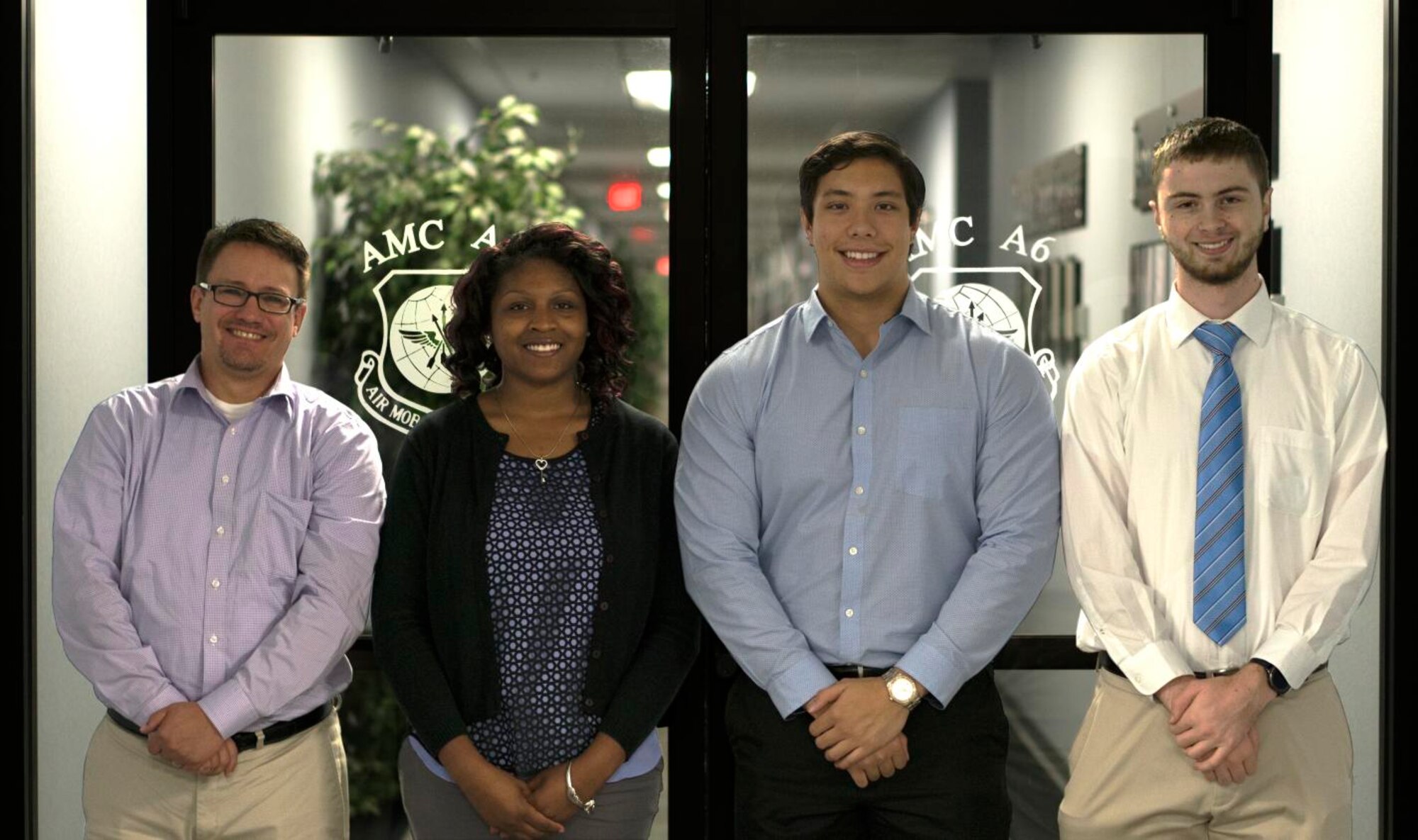 Air Mobility Command is partnering with Air Force Personnel Center and local colleges to identify candidates for the Premier College Intern Program to address an increased need for cybersecurity professionals. Pictured are the AMC 2018 summer PCIP interns Greg Kovacs, Raychael Baker, Kurt Borgsmiller, and Seth Marek. (Courtesy Photo)