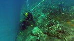 KWAJALEIN ATOLL, Marshall Islands (Oct. 12, 2018) Navy divers from Mobile Diving Salvage Unit (MDSU) 1, aboard USNS Salvor (T-ARS-52), remove fuel oil from the capsized World War II German cruiser Prinz Eugen. The safe extraction of an estimated 250,000 gallons of fuel oil from Prinz Eugen began Sept. 1 and involved nearly two dozen divers along with support from commercial tanker Humber in collaboration with the government of the Republic of the Marshall Islands and U.S. Army Garrison Kwajalein Atoll.
