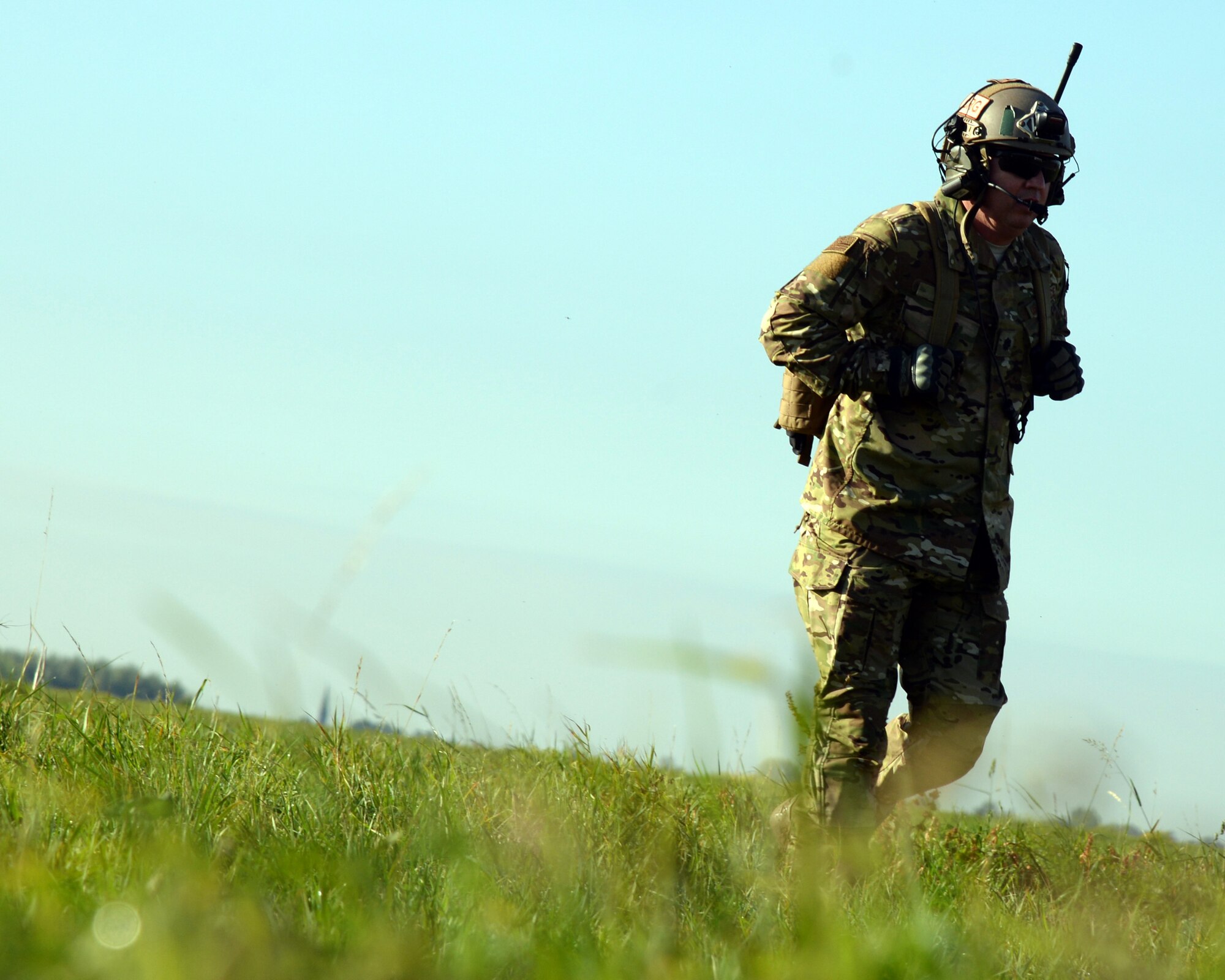 U.S. Air Force Lt. Col. Brady Vaira, 435th Contingency Response Squadron deputy commander, returns to the drop zone after parajumping form a C-130J Super Hercules on Chievers Air Base, Oct 4, 2018. This is the first time in 51 years tha parajumpers have conducted an interoperabilty exercise with Chivers Air Base. (U.S. Air Force photo by Airman 1st Class)