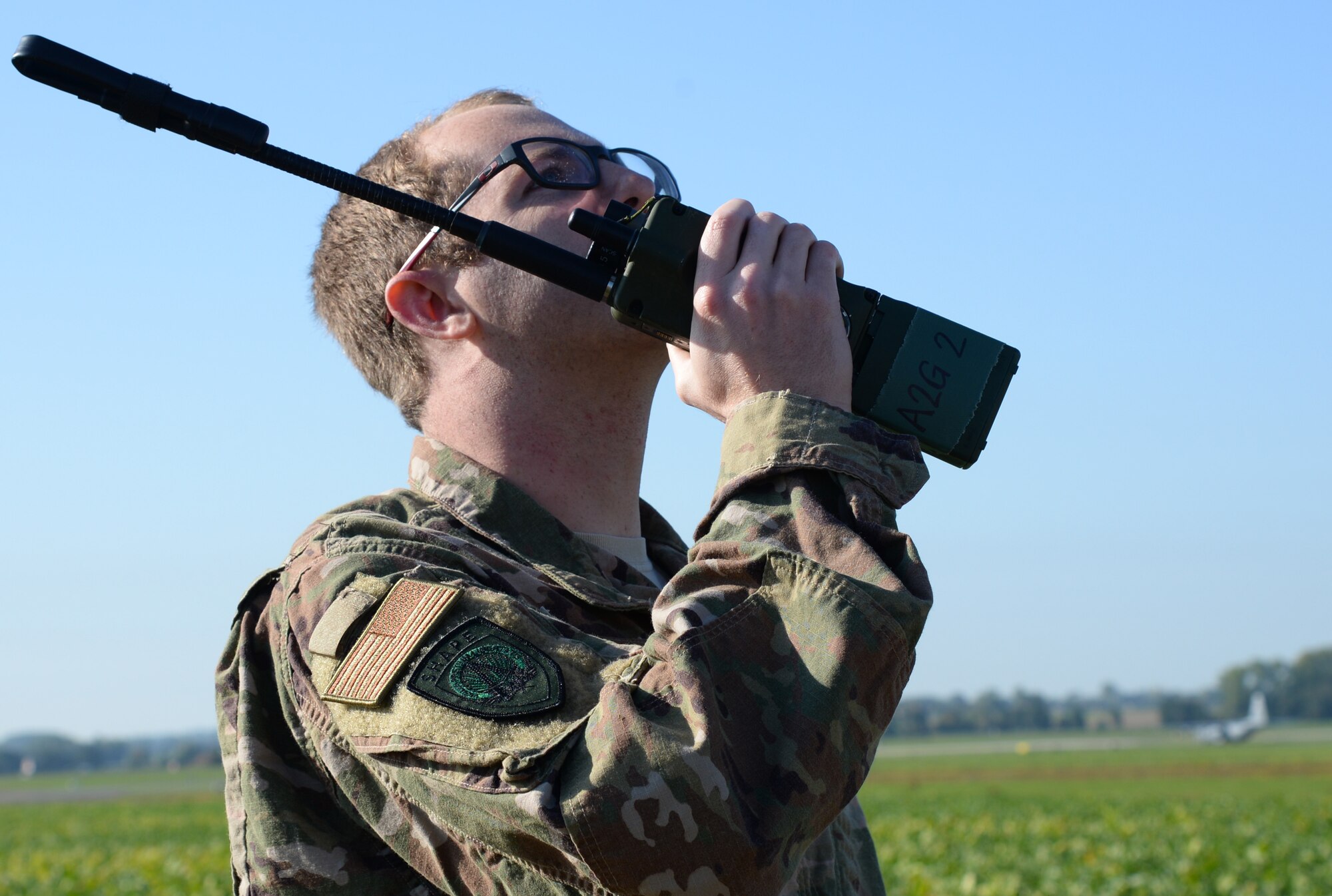 U.S. Air Force Staff Sgt. Dylan Fiveash, 424th Air Base Squadron, non-commisioned officer in charge of Airfield Managment, repsonds to a call on the flightline on Chievres Air Base, Belgium, Oct. 4, 2018. Fiveash acts as a safety observer, ensuring that aircraft are safe to land from the ground. (U.S. Air Force photo by Airmans 1st Class Airlel Leighty)