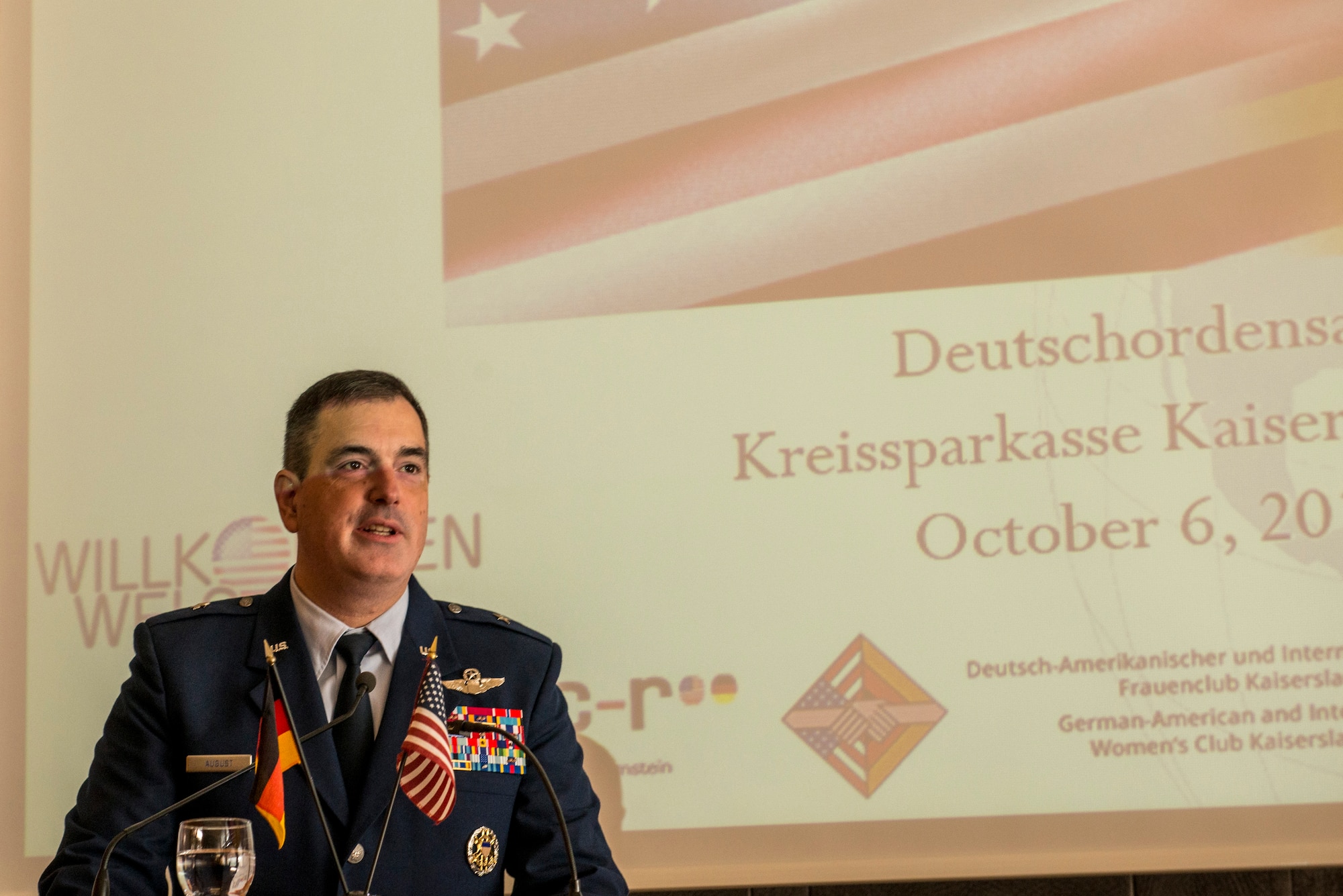 U.S. Air Force Brig Gen. Mark R. August, 86th Airlift Wing commander, delivers remarks during the 35th annual German-American Day celebration in Kaiserslautern, Germany, Oct. 6, 2018. In 1983, former U.S. President Ronald Reagan established German-American Day to honor the German families who immigrated to the U.S. and established Germantown, near Philadelphia, Pa., in 1683. (U.S. Air Force photo by Staff Sgt. Jonathan Bass)