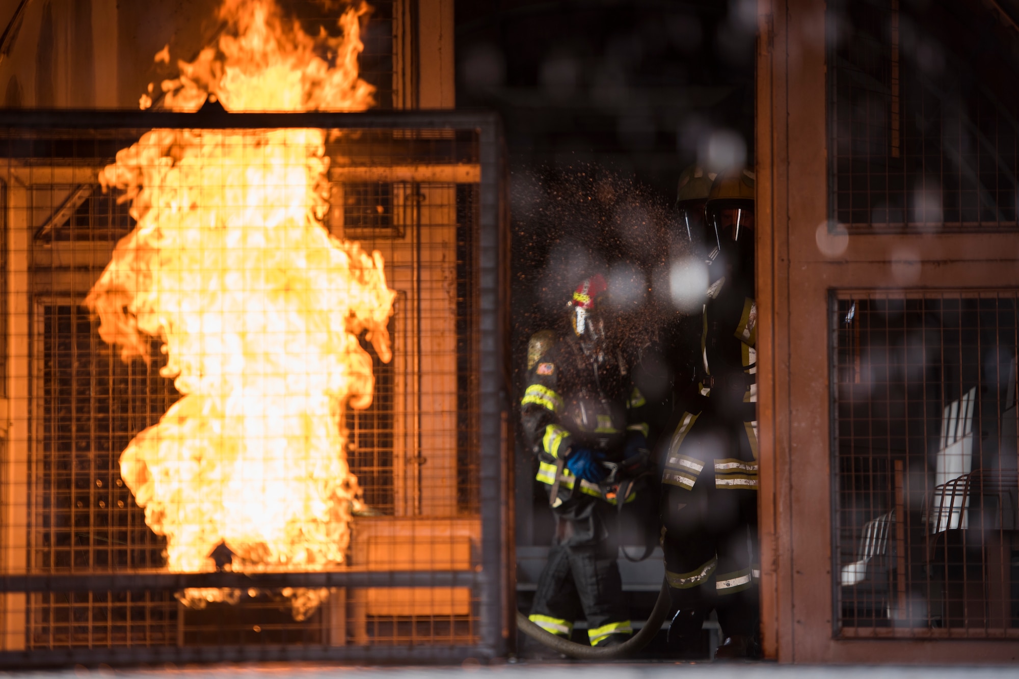 U.S. Air Forces in Europe Fire Academy members assigned to the 435th Construction and Training Squadron hosted a burn training simulation during a USAFE NATO Firefighter partnership course with Latvian and Lithuanian air force firefighters Oct. 10, 2018.
