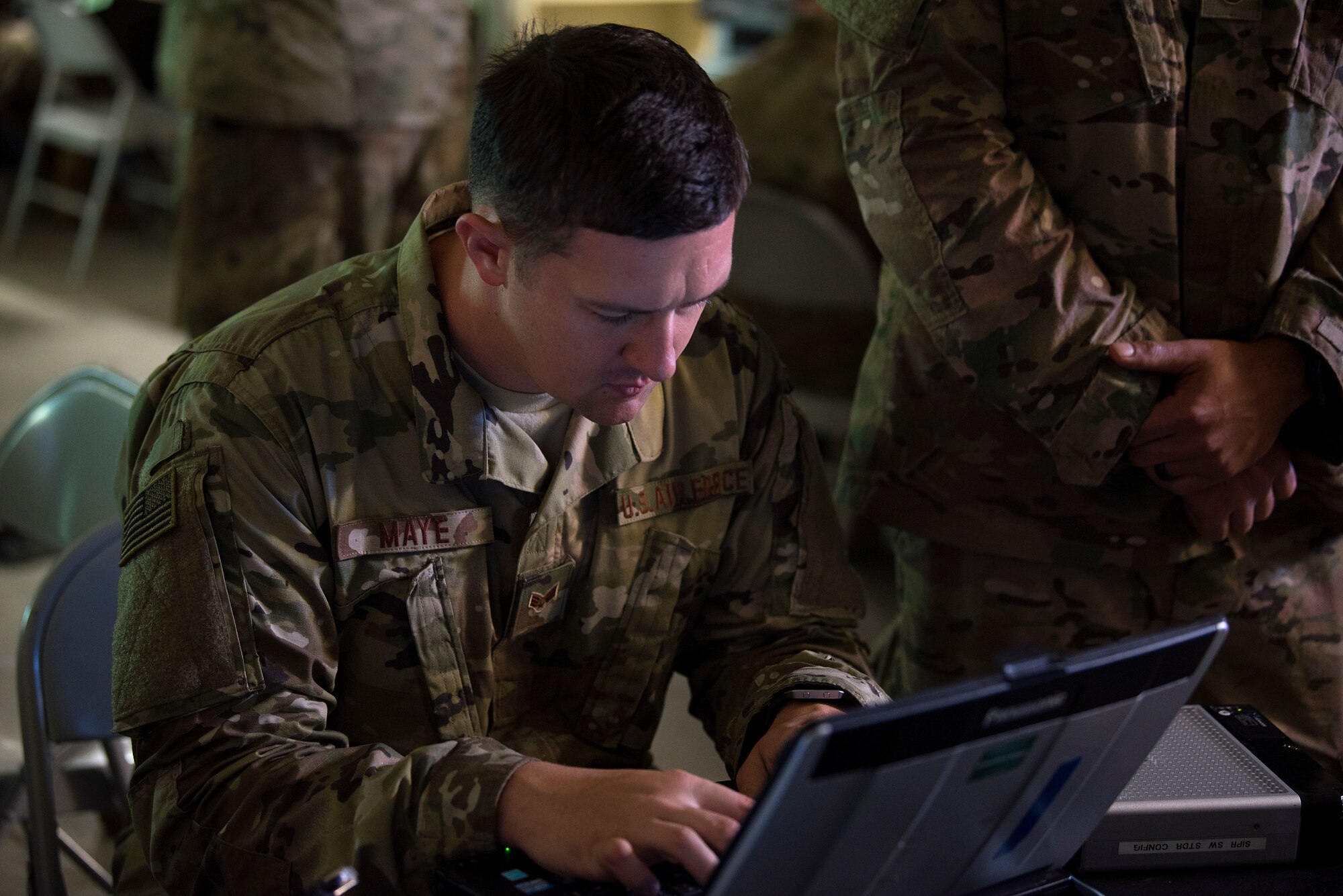 U.S. Air Force Staff Sgt. Sean May, 290th Joint Communication Support Squadron cyber transport systems specialist from MacDill Air Force Base, operates a Joint Communications Support Element Joint Building Blocks (JBLOX) system at the Florida National Guard Armory tactical operations center in Panama City, Fla., Oct. 13, 2018. JCSS, a Florida Air National Guard unit, and JCSE, part of U.S. Transportation Command, train together year-round at MacDill, driving their success as a Total Force team rapidly restoring communications capabilities for Hurricane Michael disaster relief efforts. (U.S. Air Force photo by 2nd Lieutenant Allison Mills)