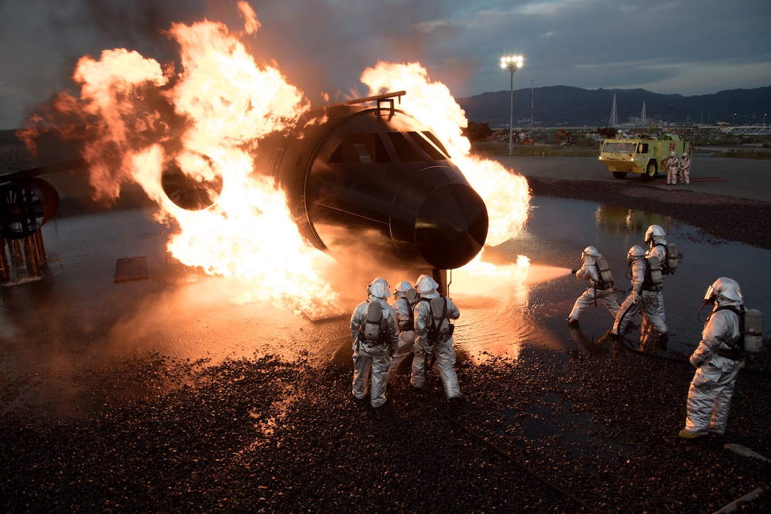 Aircraft Rescue and Firefighting Marines with Headquarters and Headquarters Squadron conduct fire containment drills at Marine Corps Air Station Iwakuni, Japan, Oct. 12, 2018. The training was conducted in order to maintain proficiency extinguishing aircraft fires in support of the air station’s mission of launching and recovering aircraft. ARFF is a special category of firefighting that involves the response, hazard mitigation, evacuation and possible rescue of passengers and crew of an aircraft involved in a ground emergency.