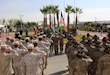 U.S. service members salute during the playing of the U.S. and Jordanian national anthems during a dedication ceremony for an expansion of the Jordan Armed Forces Joint Training Center Oct. 10, 2018. The new JTC wing provides U.S. service members a modern facility as U.S. forces and the Jordan Armed Forces continue to enhance interoperability by pursuing training opportunities together.