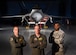 U.S. Air Force Col. Jason Hinds (center), 1st Fighter Wing commander; U.S. Air Force Col. Steve Fino (left), 1st FW vice commander; and U.S. Air Force Chief Master Sergeant Johnny Harris, 1st FW command chief, pose for a photo in front of an F-22 Raptor from the 1st FW at Joint Base Langley-Eustis, Virginia, Oct. 10, 2018. The 100-year-old 1st FW is home to the 94th Fighter Squadron, 27th FS and the 71st Fighter Training Squadron. (U.S. Air Force photo by Staff Sgt. Carlin Leslie/Released)