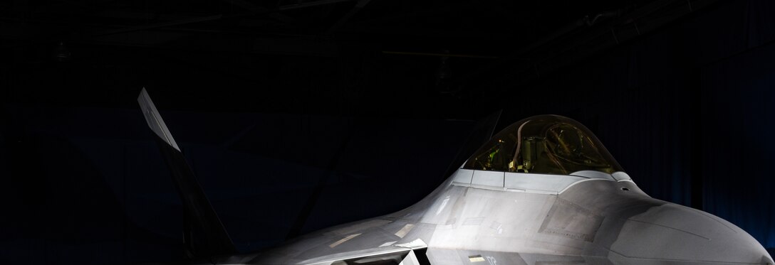 An F-22 Raptor from the 1st Fighter Wing is on display in the static display hanger at Joint Base Langley-Eustis, Virginia, Oct. 10, 2018. The F-22 Raptor on display is the flag ship aircraft of the 27th Fighter Squadron.  (U.S. Air Force photo by Staff Sgt. Carlin Leslie/Released)