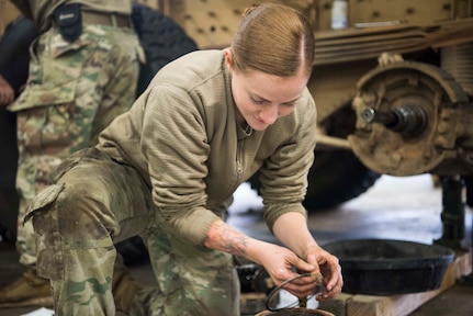 U.S. Army Spc. Savannah Padilla, a 135th Forward Support Company, 188th Brigade Support Battalion multiple launch rocket system repair mechanic, takes out a seal on a wheel hub of a M142 High Mobility Artillery Rocket System (HIMARS) during Red Flag-Alaska 19-1 at Joint Base Elmendorf-Richardson, Alaska, Oct. 11, 2018. Their unit was tasked to provide long-range artillery support for RF-A exercising interoperability with U.S. Air Force units to showcase their capabilities and develop a relationship with the other services.