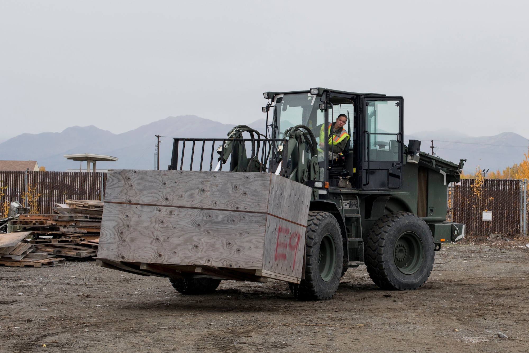 U.S. Air Force Airman 1st Class Pamela Proteau, a 773d Logistics Readiness Squadron vehicle operator, picks up a crate using a 10k all-terrain forklift to remove wreckage debris at Joint Base Elmendorf-Richardson, Alaska, Sept. 27, 2018. Proteau was part of a large wreckage disposal team whose mission was to remove debris from the fatal crash of the Sitka 43 C-17 Globemaster III that had been stored at JBER since 2010. After multiple shipments, the ‘Sitka 43’ wreckage is finding a new purpose at the Air Force Safety Center (AFSEC) Crash Lab at Kirtland Air Force Base, N.M.