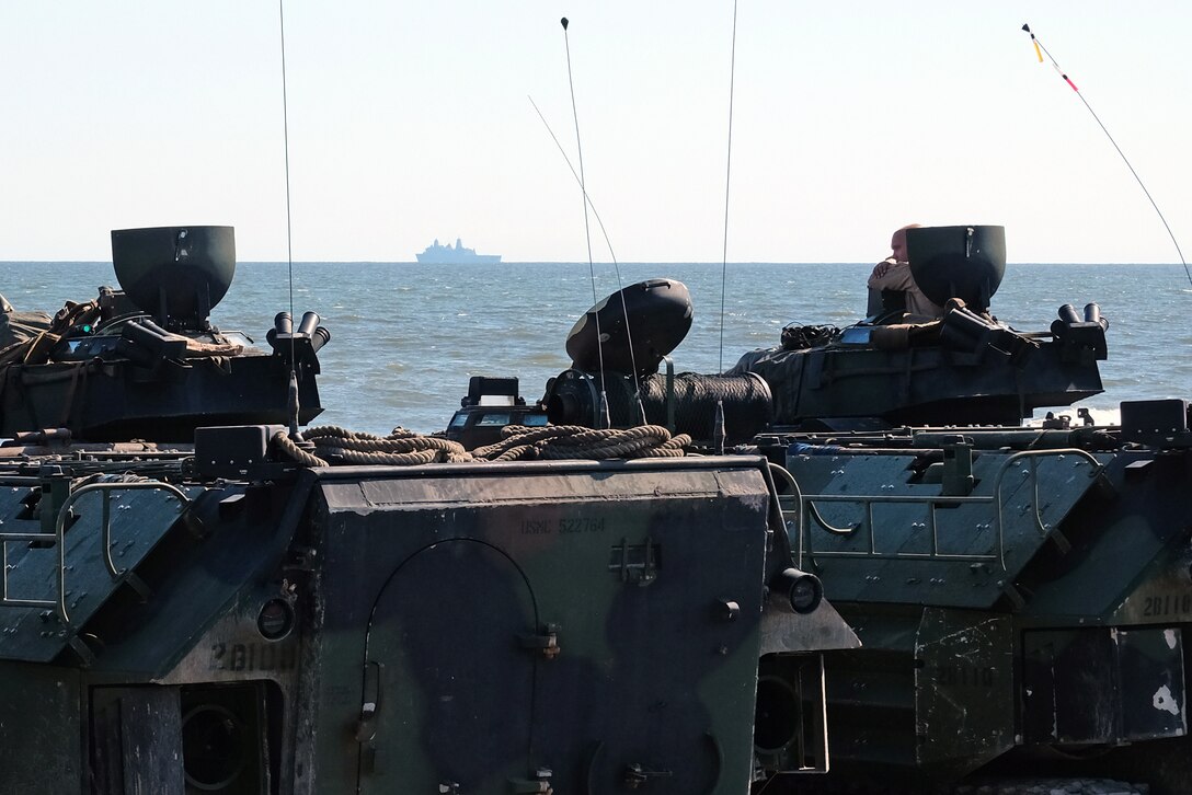 Amphibious Assault Vehicles with the 24th Marine Expeditionary Unit prepare to embark aboard USS New York (LPD 21) in preparation for Exercise Trident Juncture 2018 Oct. 3 on Camp Lejeune.  Events during Trident Juncture will provide the 24th MEU opportunities to train as a Marine Air Ground Task Force in unique environments in support of partner nations. (U.S. Marine Corps photo by Gunnery Sgt. Robert Durham)