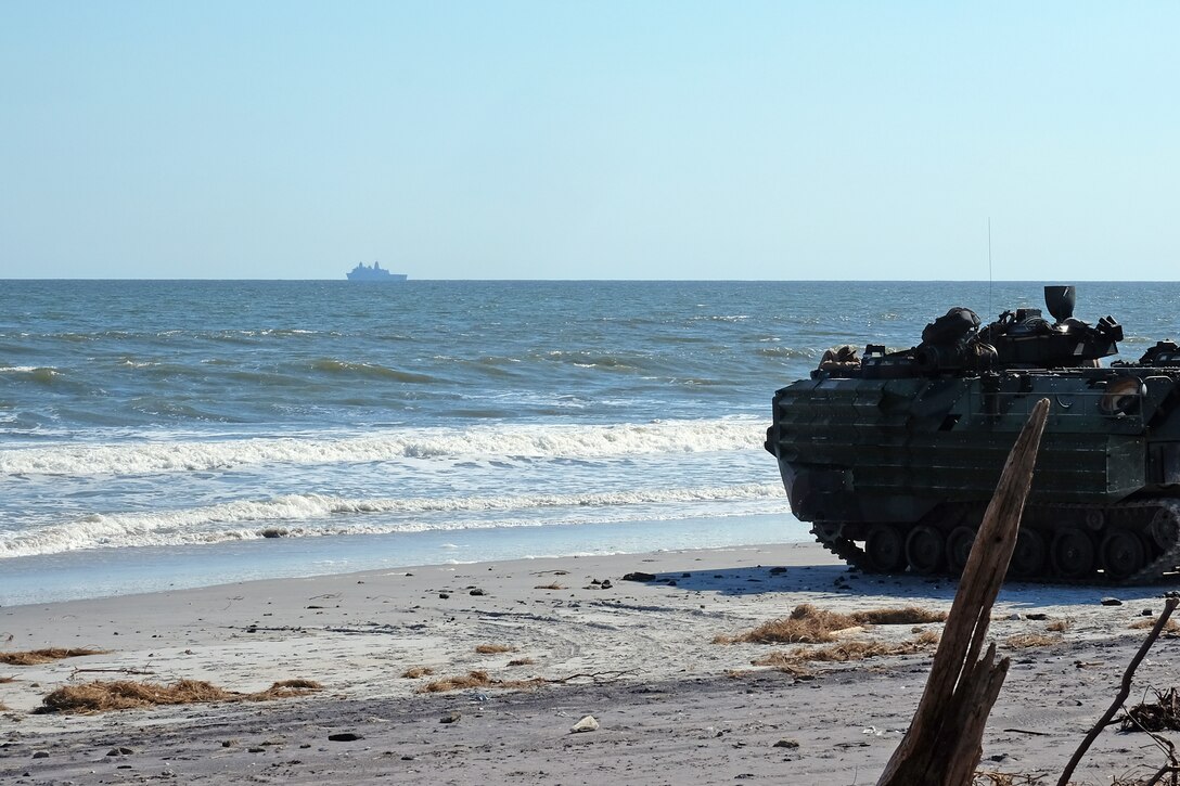 An Amphibious Assault Vehicle with the 24th Marine Expeditionary Unit prepares to embark on USS New York (LPD 21) Oct. 3 in preparation for Exercise Trident Juncture 2018.  Events during Trident Juncture will provide the 24th MEU opportunities to train as a Marine Air Ground Task Force in unique environments in support of partner nations. (U.S. Marine Corps photo by Gunnery Sgt. Robert Durham)