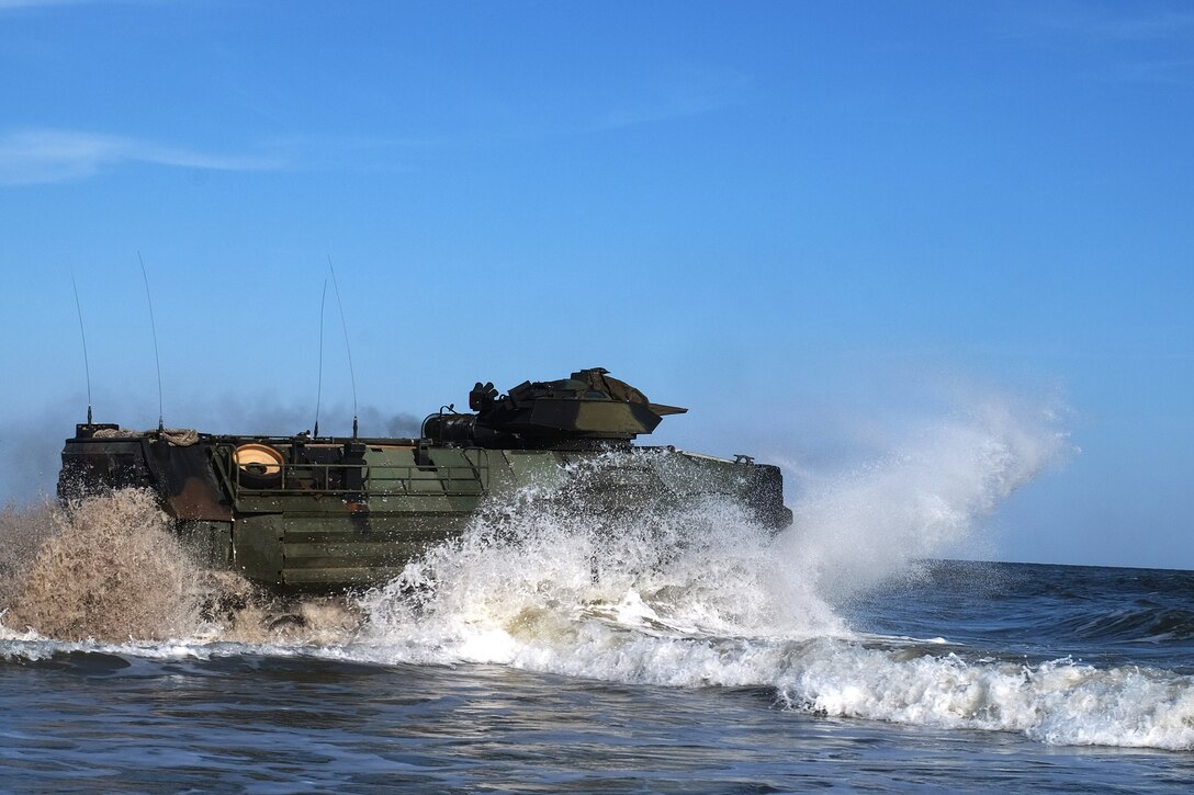 An Amphibious Assault Vehicle with the 24th Marine Expeditionary Unit enters the water aboard Camp Lejeune Oct. 3 to embark on USS New York (LPD 21) in preparation for Exercise Trident Juncture 2018.  Events during Trident Juncture will provide the 24th MEU opportunities to train as a Marine Air Ground Task Force in unique environments in support of partner nations. (U.S. Marine Corps photo by Gunnery Sgt. Robert Durham)