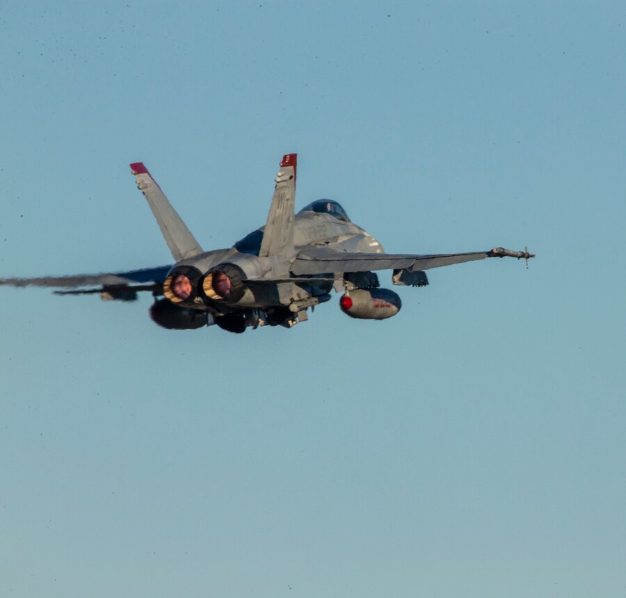 A U.S. Marine Corps F/A-18C Hornet assigned to Marine Fighter Attack Squadron (VMFA) 232, Marine Aircraft Group 11, 3rd Marine Aircraft Wing, in flight during Red Flag-Alaska 19-1 at Eielson Air Force Base, Alaska, Oct. 8, 2018. Red Flag is a series of U.S. Pacific Air Force commander-directed field training exercise for U.S. and coalition forces to provide a realistic joint offensive counter-air, interdiction, close air support and large-force employment training in a simulated combat environment. (U.S. Marine Corps photo by Sergeant Maria A. Noyola)
