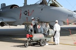 Airman 1st Class Molly Michael and Tech. Sgt. Ben Jonkman, both A-10 Thunderbolt II crew chiefs at Selfridge Air National Guard Base, Mich., service A-10s with liquid oxygen at Selfridge, Oct. 14, 2018. Michael recently completed her initial technical training and Jonkman was supervising her on-the-job training.