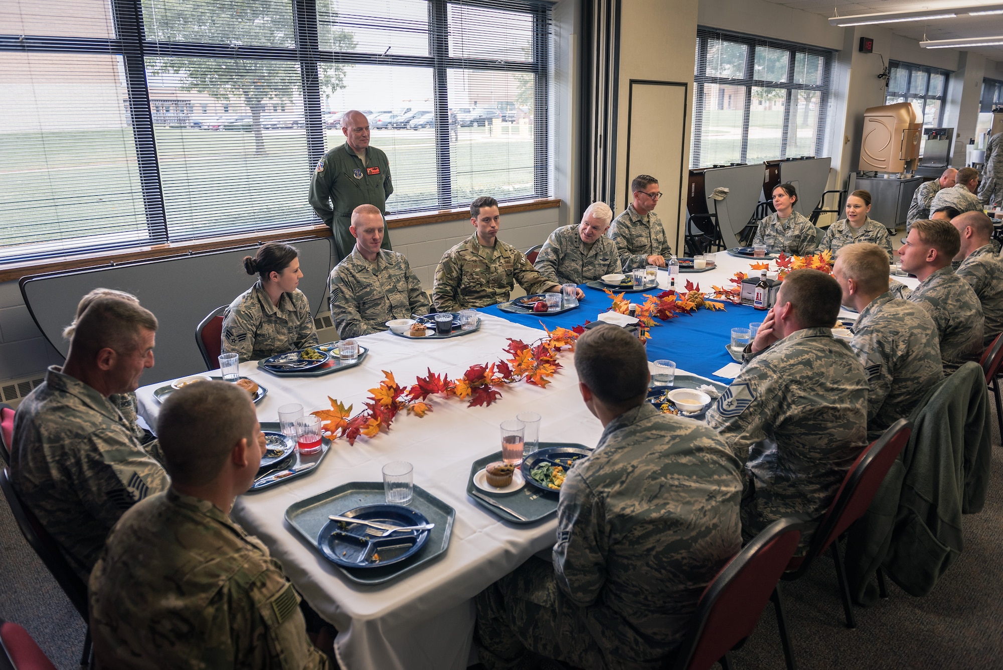 U.S. Air Force Lt. Gen. L. Scott Rice, the director of the Air National Guard, visits with Airmen at lunch during a visit to the 182nd Airlift Wing in Peoria, Ill., Oct. 14, 2018.