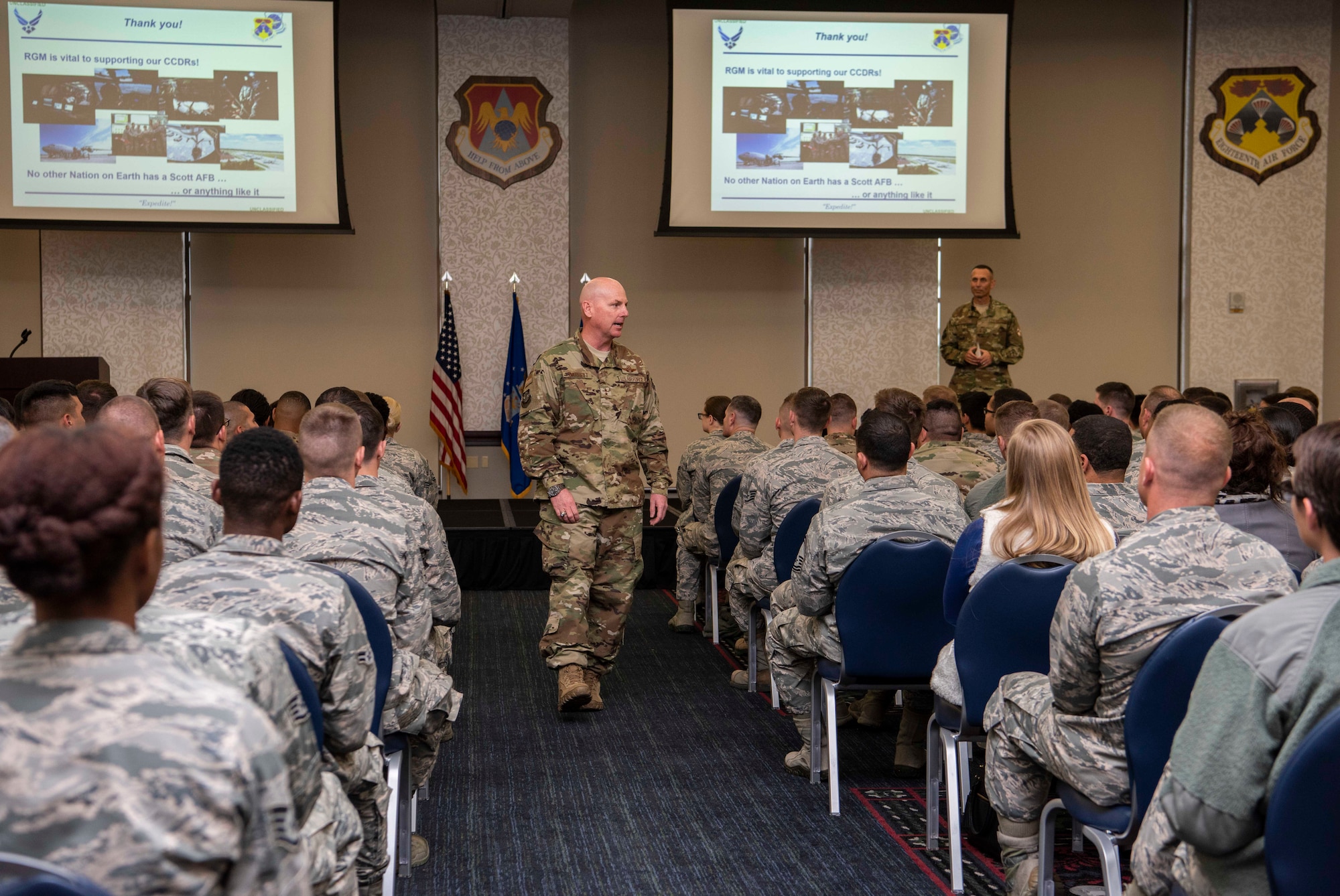Maj. Gen. Sam Barrett, 18th Air Force commander, speaks during a commander’s call Oct. 12, 2018 at Scott Air Force Base, Illinois. A commander’s call is a direct form of communication were Airmen of different units, who don’t always get an opportunity to speak to the commander, can voice their opinions and receive vital information. (U.S. Air Force photo by Senior Airman Melissa Estevez)