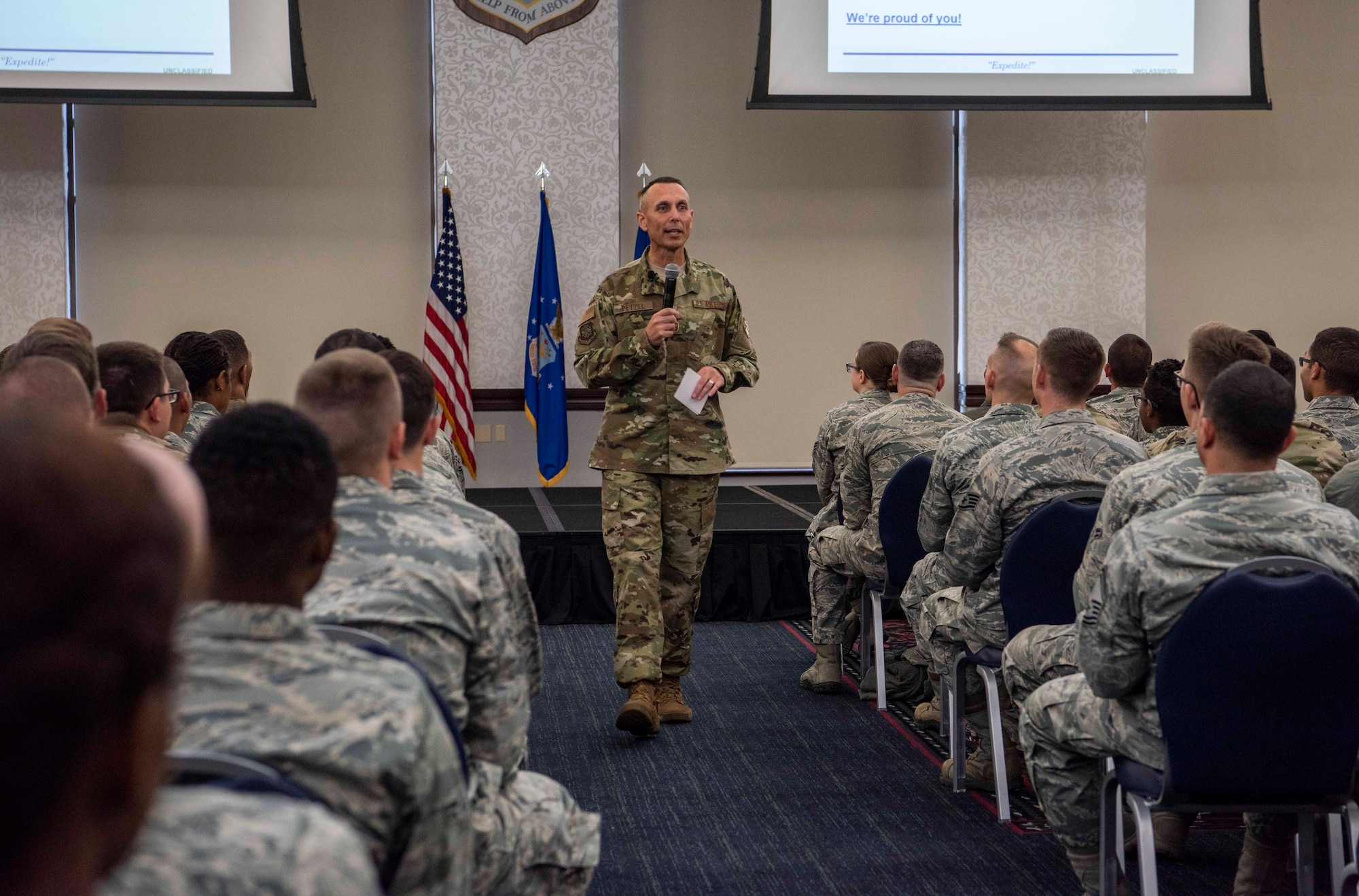 Chief Master Sgt. Todd Petzel, 18th Air Force command chief, speaks during a commander’s call Oct. 12, 2018 at Scott Air Force Base, Illinois. Petzel focused on the acronym AMC, which stood for Airmen, Mission and Culture. He emphasized that nothing happens alone and a cohesive team is needed in order to complete the mission. (U.S. Air Force photo by Senior Airman Melissa Estevez)