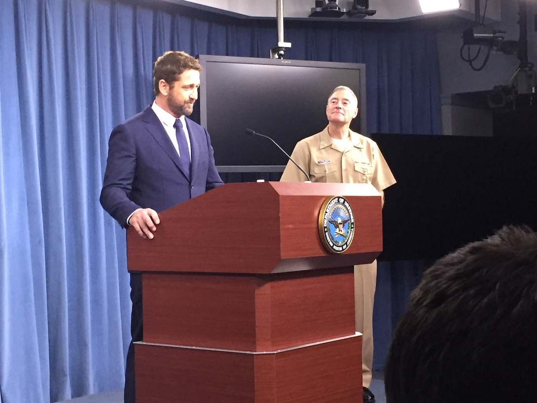 Actor Gerard Butler and Navy Vice Adm. Fritz Roegge, current president of the National Defense University, speak about the movie “Hunter-Killer” during a Pentagon news conference, Oct. 15, 2018. DOD photo by Jim Garamone