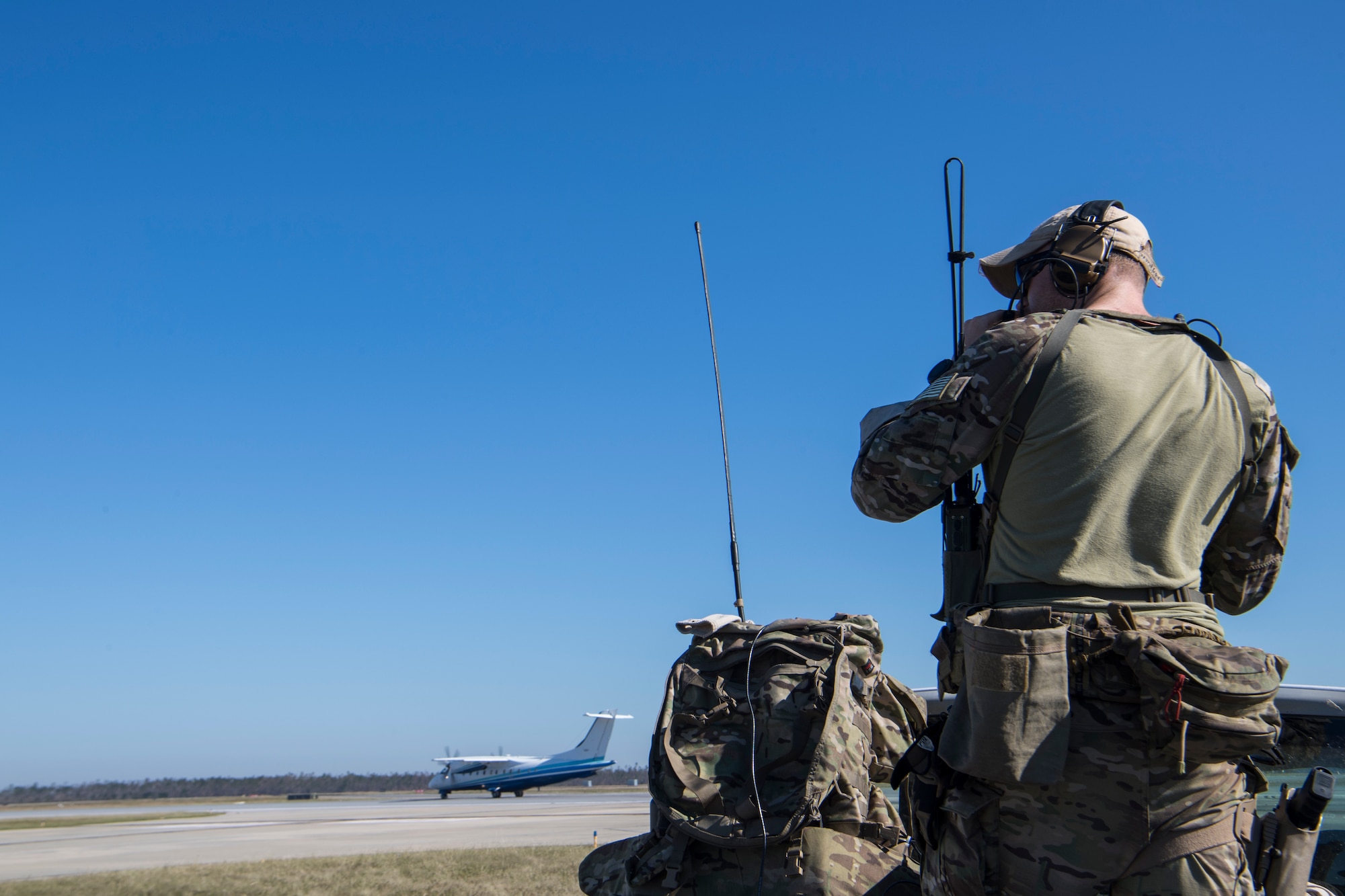 A Special Tactics Airman with the 23rd Special Tactics Squadron controls an aircraft at Tyndall Air Force Base, Florida, Oct. 14, 2018.
