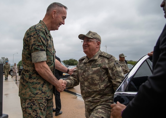 Chairman of the Joint Chiefs of Staff Gen. Joe Dunford greets Chief of the Turkish General Staff Gen. Yasar Guler today outside of the Pentagon in Washington D.C., Oct. 15, 2018.