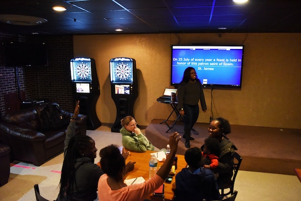 Hispanic Heritage Month trivia night participants answer cultural questions at Ellsworth Air Force Base, S.D., Oct. 12, 2018. In honor of Hispanic Heritage Month, the Ellsworth AFB Diversity Council hosted a book reading at the Child Development Center and a trivia night at the Dakota’s Club. (U.S. Air Force photo by Airman 1st Class Thomas Karol)