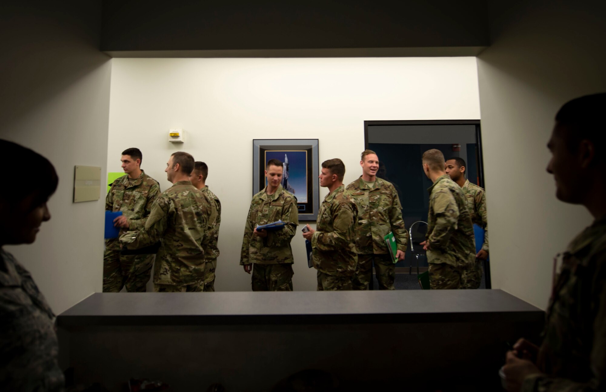 U.S. Airmen assigned to the 20th Fighter Wing go through a processing line at the Chandler Deployment Processing Center at Shaw Air Force Base, S.C., Oct. 10, 2018.