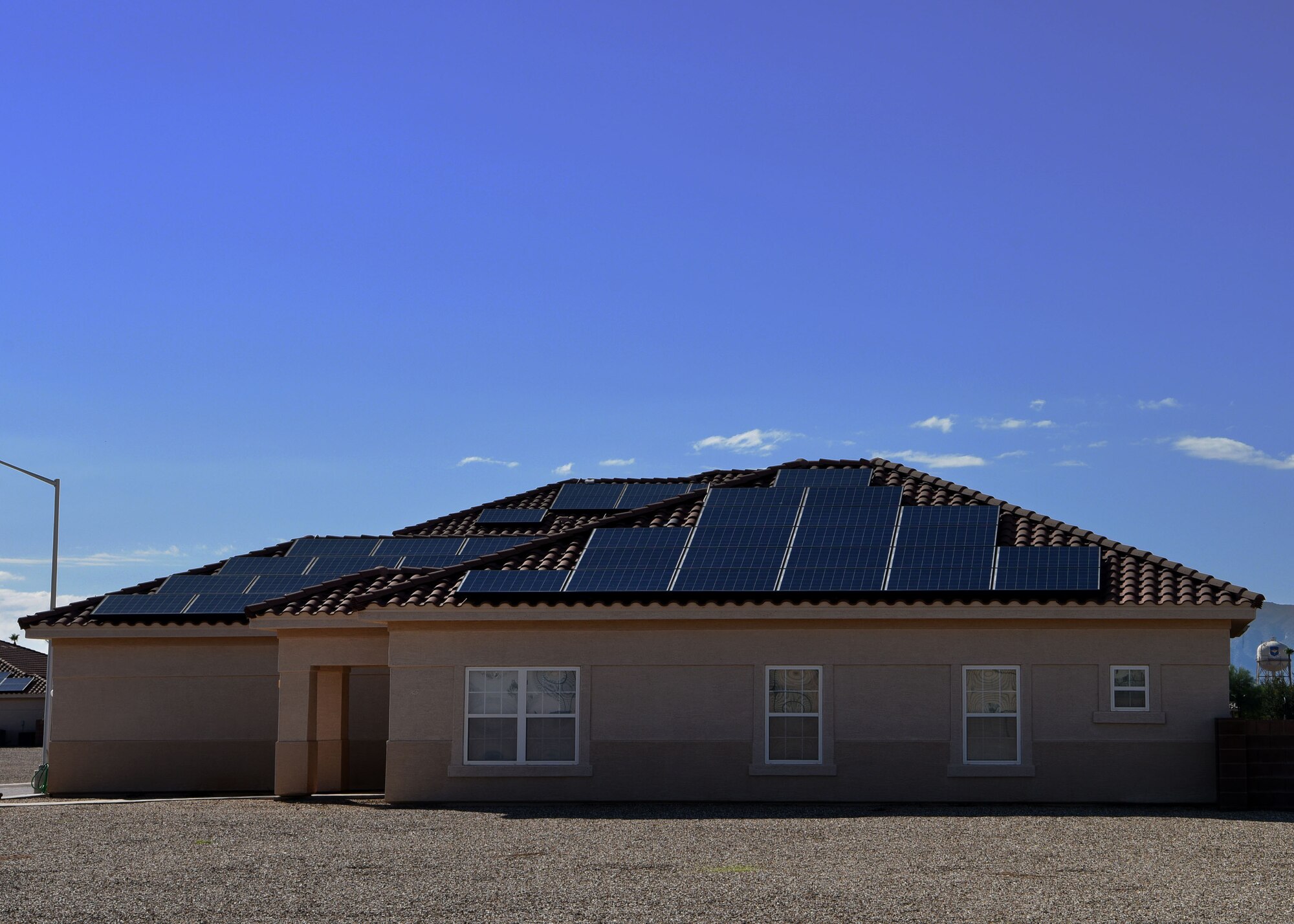 A house with solar panels sits on Luke Air Force Base, Ariz., Oct. 15, 2016.