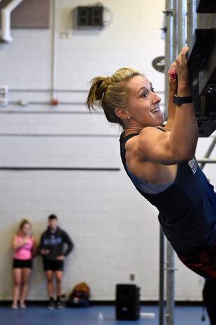 Capt. Abigail Wilkins, an Air Force ROTC instructor at Valdosta State University, Ga., navigates a horizontal wall during the Alpha Warrior regional championship Oct. 13, 2018, at Joint Base Charleston, S.C.