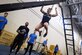 Capt. Abigail Wilkins, an Air Force ROTC instructor at Valdosta State University, Ga., leaps across an incline ladder during the Alpha Warrior regional championship Oct. 13, 2018, at Joint Base Charleston, S.C.