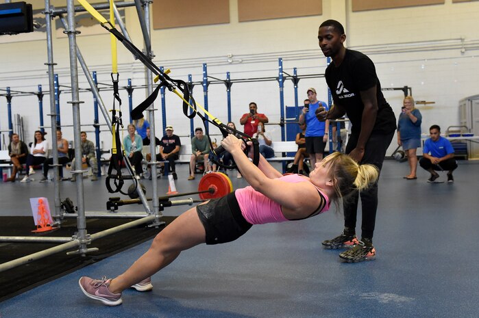 2nd Lt. Darby Germain, a section commander assigned to the 628th Force Support Squadron, performs incline back rows during the Alpha Warrior regional competition Oct. 13, 2018, at Joint Base Charleston, S.C.