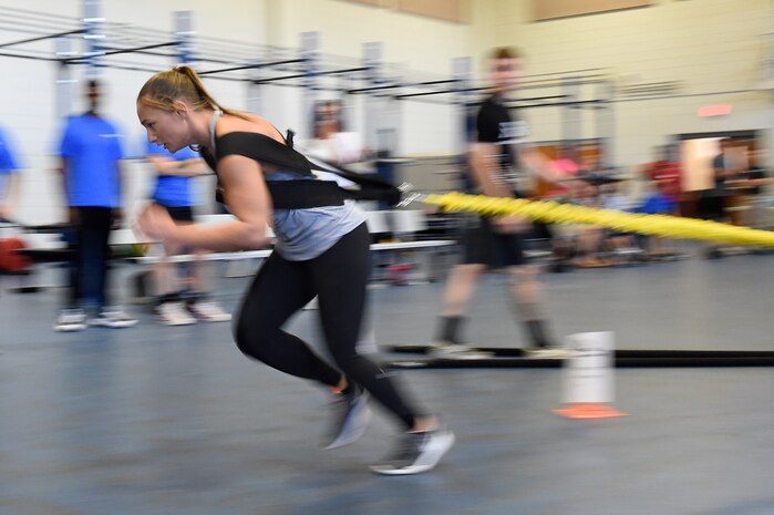 Tech. Sgt. Leanne Hardin, a supply supervisor assigned to the 628th Logistics Readiness Squadron, sprints while attached to a tether during the Alpha Warrior regional competition Oct. 13, 2018, at Joint Base Charleston, S.C.