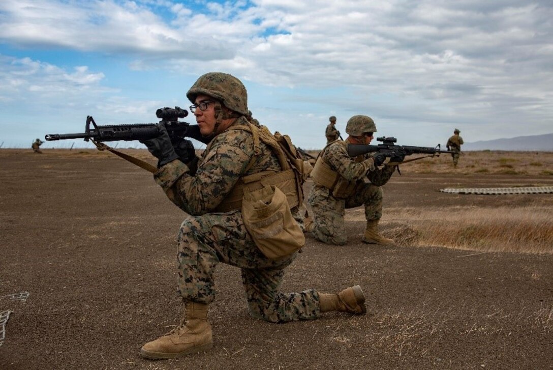 U.S. Marines with Service Company, 9th Communications Battalion, I Marine Expeditionary Force Information Group, provide security while awaiting the arrival of an aircraft during a casualty evacuation drill at Marine Corps Base Camp Pendleton, Oct. 2, 2018. The drill was part of a field exercise the battalion executed providing the Marines realistic combat training. (U.S. Marine Corps photo by Cpl. Cutler Brice.)