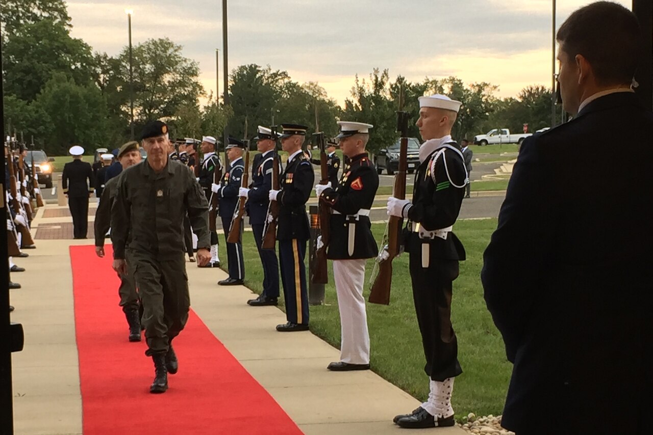 A chief of defense arrives at the Counter Violent Extremist Organization conference at Joint Base Andrews, Md.