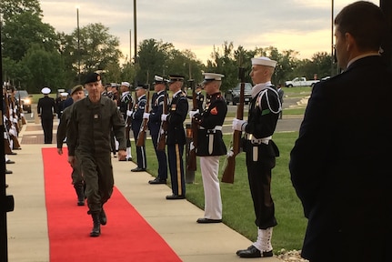 A chief of defense arrives at the Counter Violent Extremist Organization conference at Joint Base Andrews, Md.