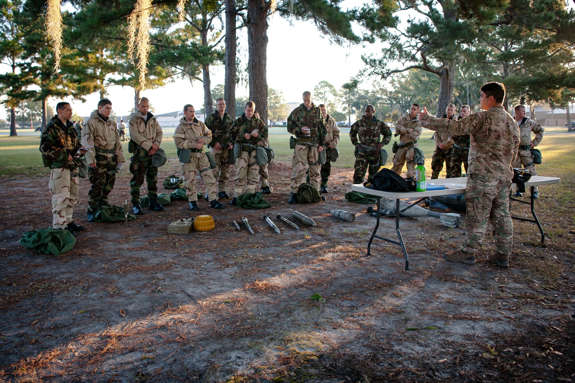 Capt. Akira Nervik, 23d Civil Engineer Squadron (CES) explosive ordnance disposal (EOD) flight commander, teaches Airmen from the 23d CES during the Ability to Survive and Operate (ATSO) Rodeo, Sept. 20, 2018, at Moody Air Force Base, Ga. Approximately 2,000 Airmen executed self-aid and buddy care, security and chemical attack avoidance missions under duress in a simulated chemical warfare environment. Testing and enhancing their operational readiness, this prepared the 23d Wing for the upcoming Phase II exercise during Nov. 5-8, 2018, which will be conducted for the first time in seven years. (U.S. Air Force photo by Airman Taryn Butler)