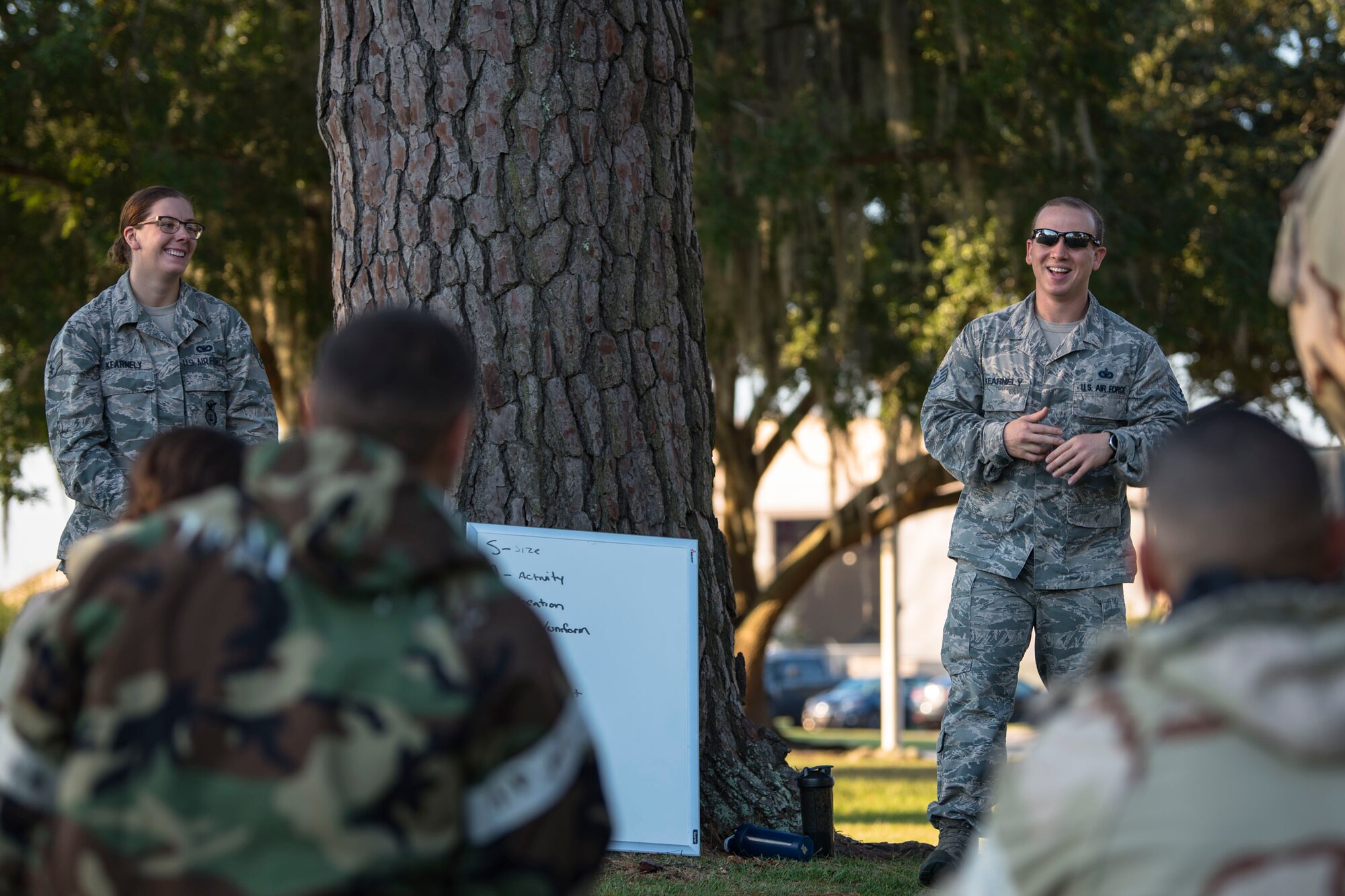 Staff Sgt. Sean Kearnely, right, 23d Security Forces Squadron unit training manger, instructs Airmen from the 23d Civil Engineer Squadron during the Ability to Survive and Operate (ATSO) Rodeo, Sept. 20, 2018, at Moody Air Force Base, Ga. Approximately 2,000 Airmen executed self-aid and buddy care, security and chemical attack avoidance missions under duress in a simulated chemical warfare environment. Testing and enhancing their operational readiness, this prepared the 23d Wing for the upcoming Phase II exercise during Nov. 5-8, 2018, which will be conducted for the first time in seven years. (U.S. Air Force photo by Airman Taryn Butler)