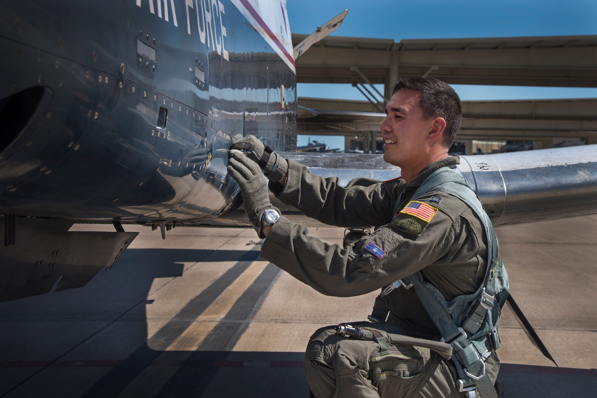 Capt. Harold Parker, 434th Flying Training Squadron flight commander and T-6A Texan II instructor pilot, completes steps in his pre-flight checklist, Oct. 10, 2018, at Laughlin Air Force Base, Texas. Parker earned the “Xler of the week” award for helping his student’s complete pilot training and increase base morale by organizing this year’s Adventure Race. (U.S. Air Force photo by Senior Airman Daniel Hambor)