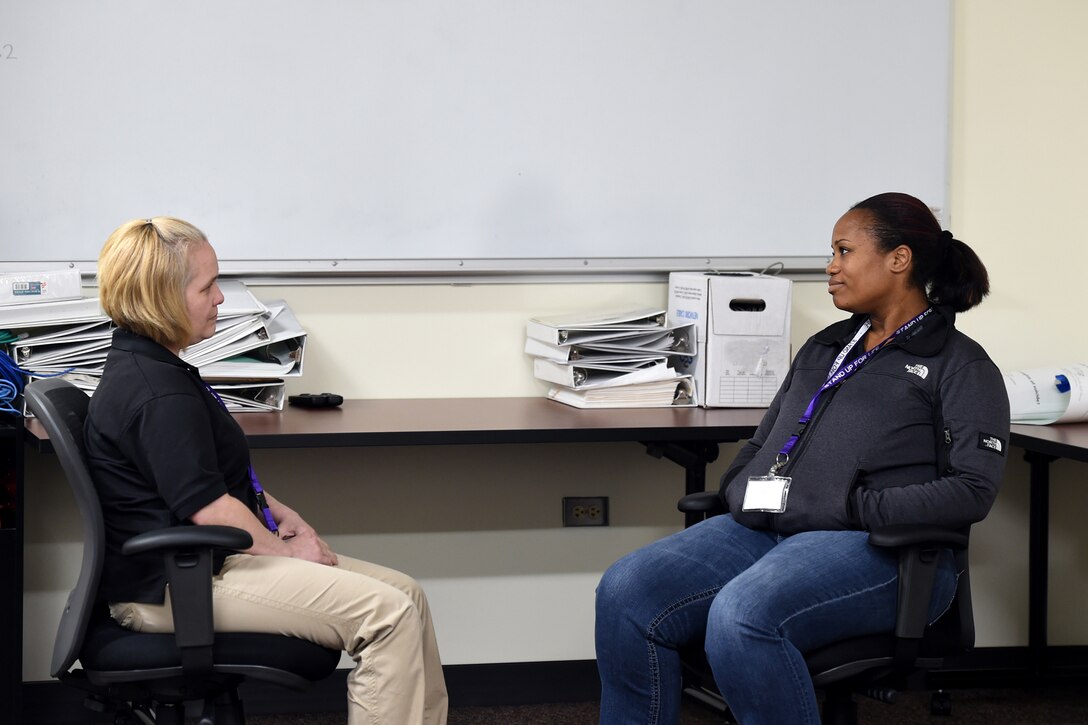 Training participants role-play an intervention with one person as the caregiver, and the other as someone thinking about suicide, during the 85th Support Command’s Applied Suicide Intervention Skills Training workshop, Sep. 27-28, 2018.