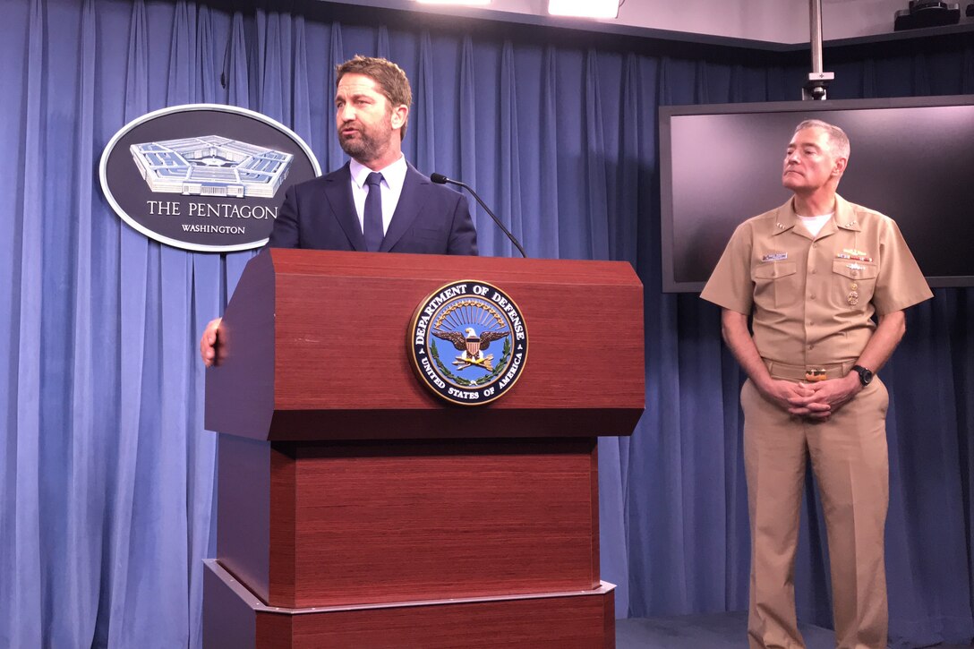 Actor Gerard Butler fields questions from reporters at the Pentagon.