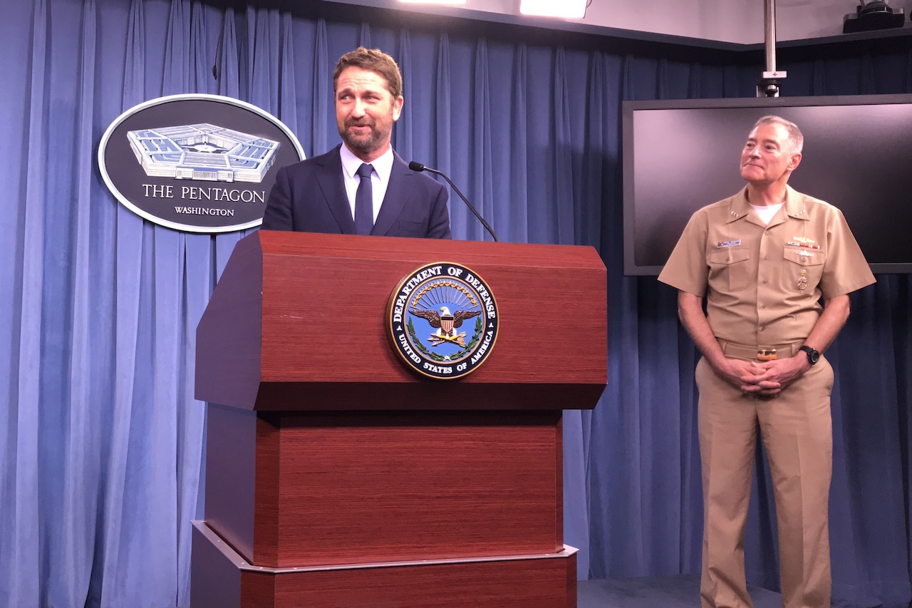 Actor Gerard Butler fields questions from reporters at the Pentagon.
