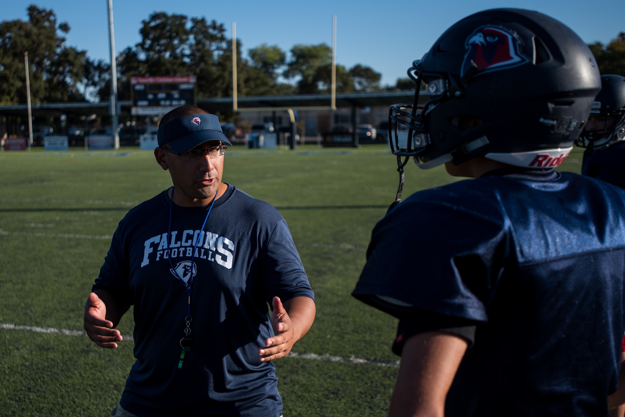 Friday Night Lights: Travis Airman leads in the community through football