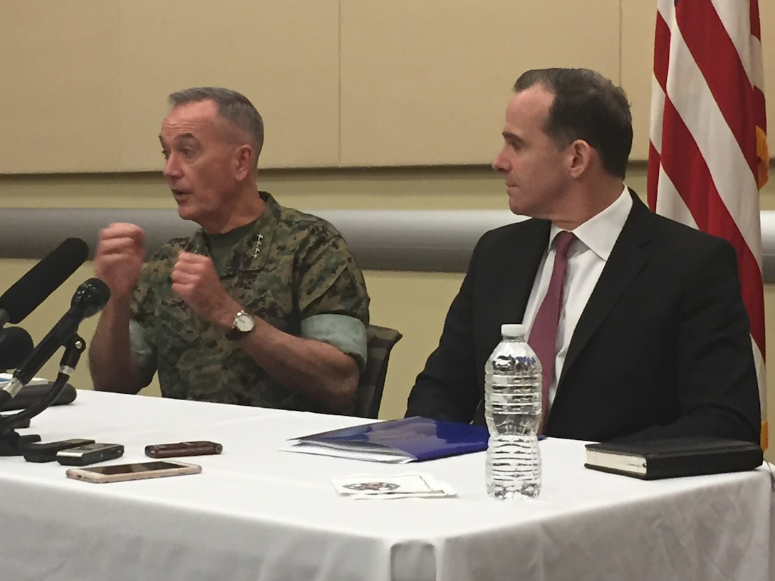 Marine Corps Gen. Joe Dunford, the chairman of the Joint Chiefs of Staff, and Brett McGurk, the U.S. special envoy for the global coalition to defeat the Islamic State of Iraq and Syria, brief the press at the Counter Violent Extremist Organization Chiefs of Defense Conference held at Joint Base Andrews, Md.